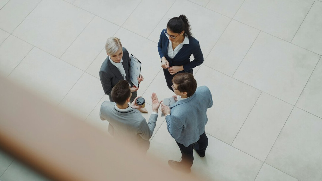 people discussing in a circle